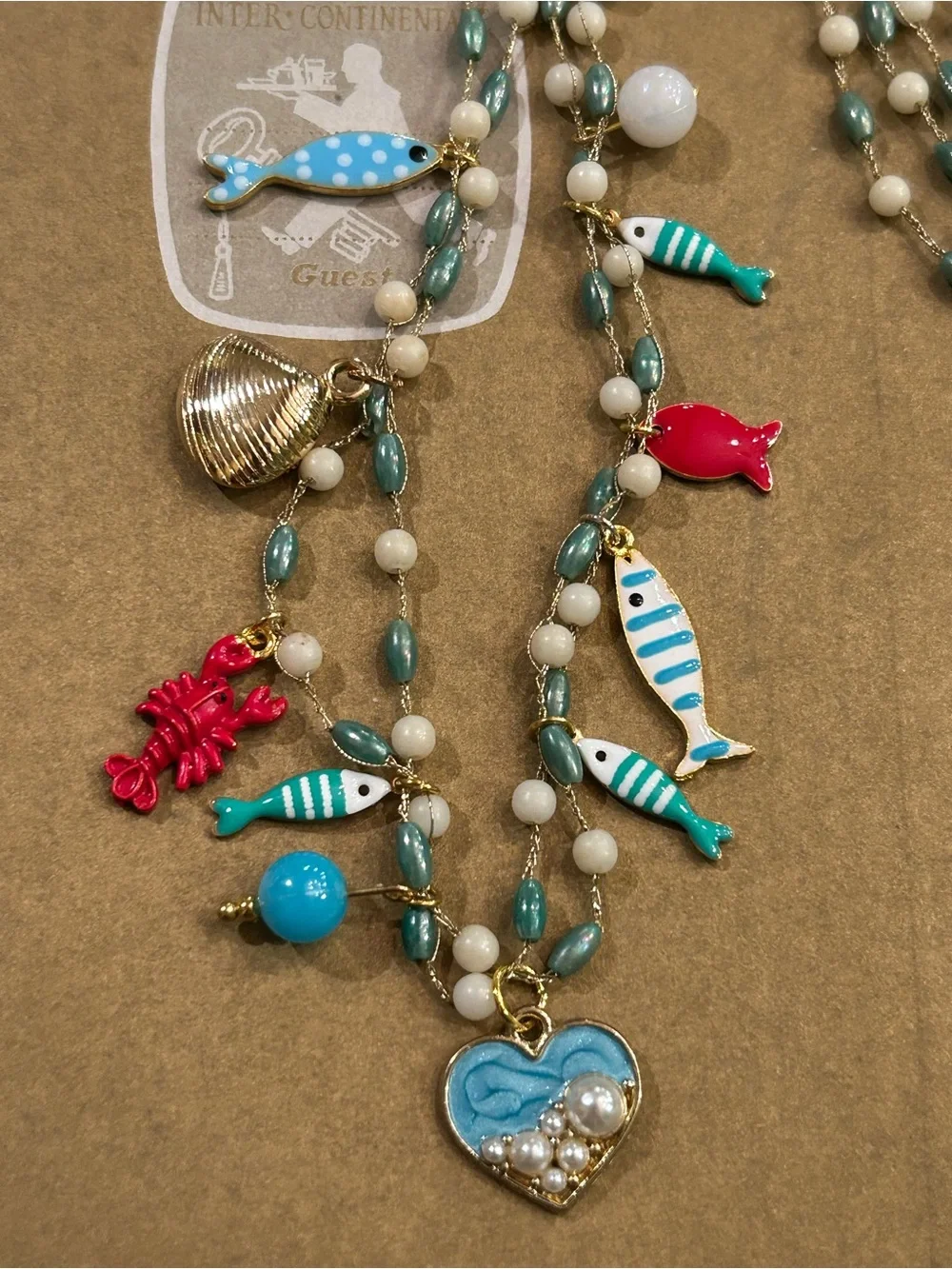 NWOT Necklace “1 Fish, 2 Fish, Red Fish…enamel Sea Life Charms, Aqua white beads